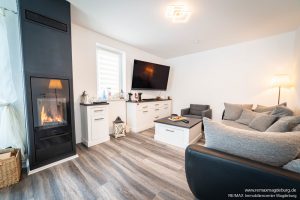 Wohnzimmer mit Kamin